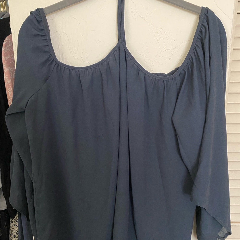 Loft off the shoulder blouse size M, it’s loose fitting and very comfy.